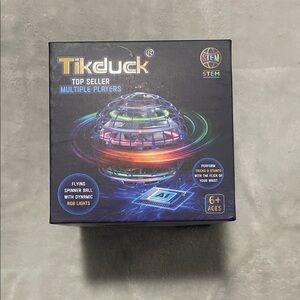 Amazon Tikduck Flying Spinner Ball Toy - Black Box with Multicolor RGB Graphics